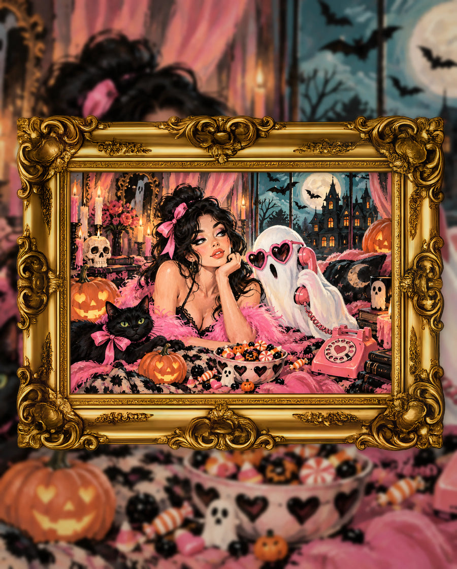 Girl Talk from Beyond, an original DAILE Studio Halloween artwork in an ornate gold frame — a dark-haired woman in a pink feather boa beside a ghost in heart sunglasses talking on a pink telephone, with a black cat and jack-o'-lanterns.