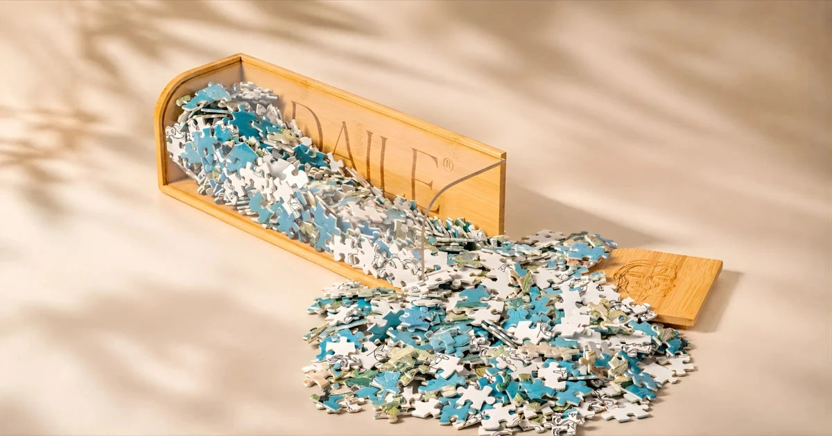 Puzzle pieces and a bamboo capsule in warm light.