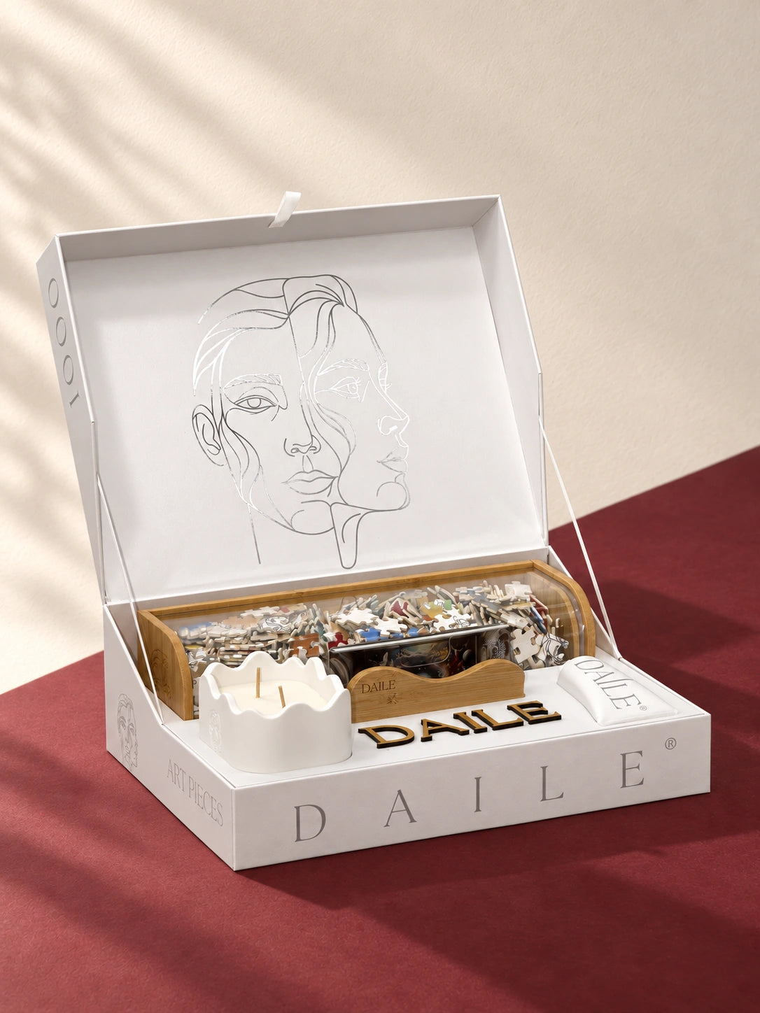 Signature gift set with puzzle capsule, display kit and candle.